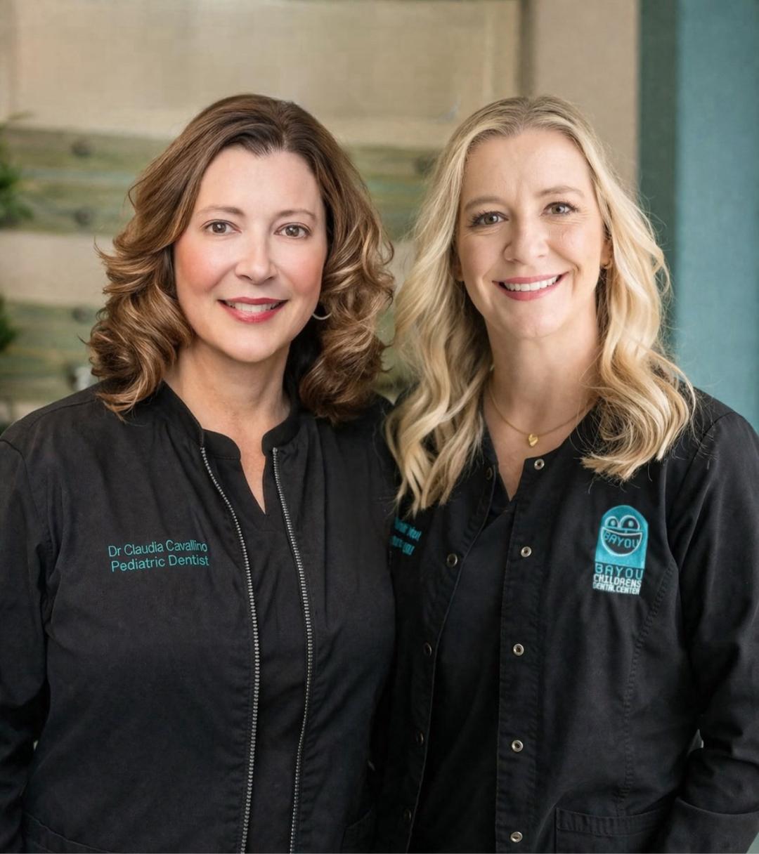 Two dentists smiling together